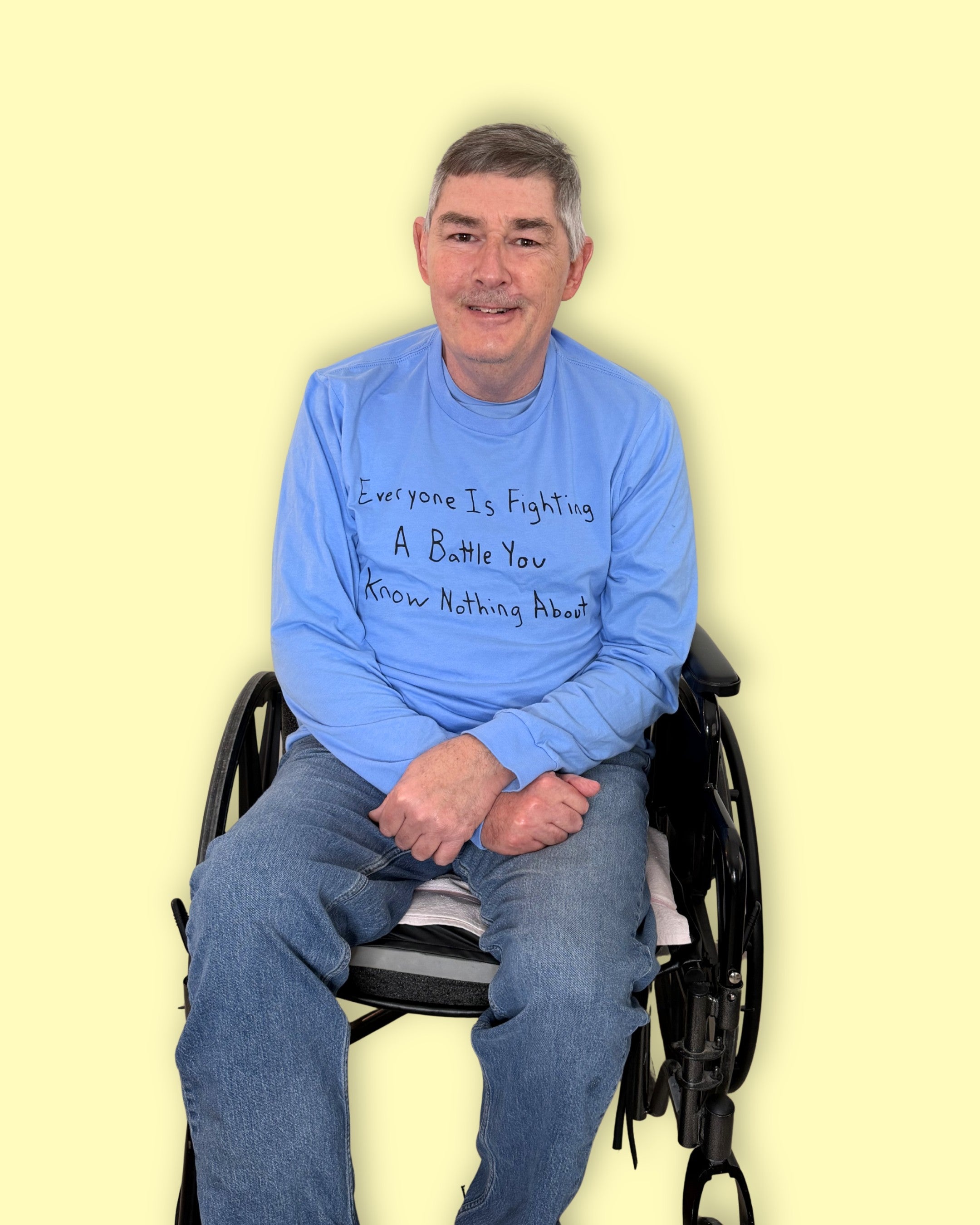 Uncle Andy models his hand drawn shirt for stroke awareness month. 