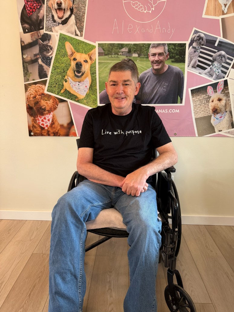 Uncle Andy poses for a photo in his shirt that says "Live With Purpose". 