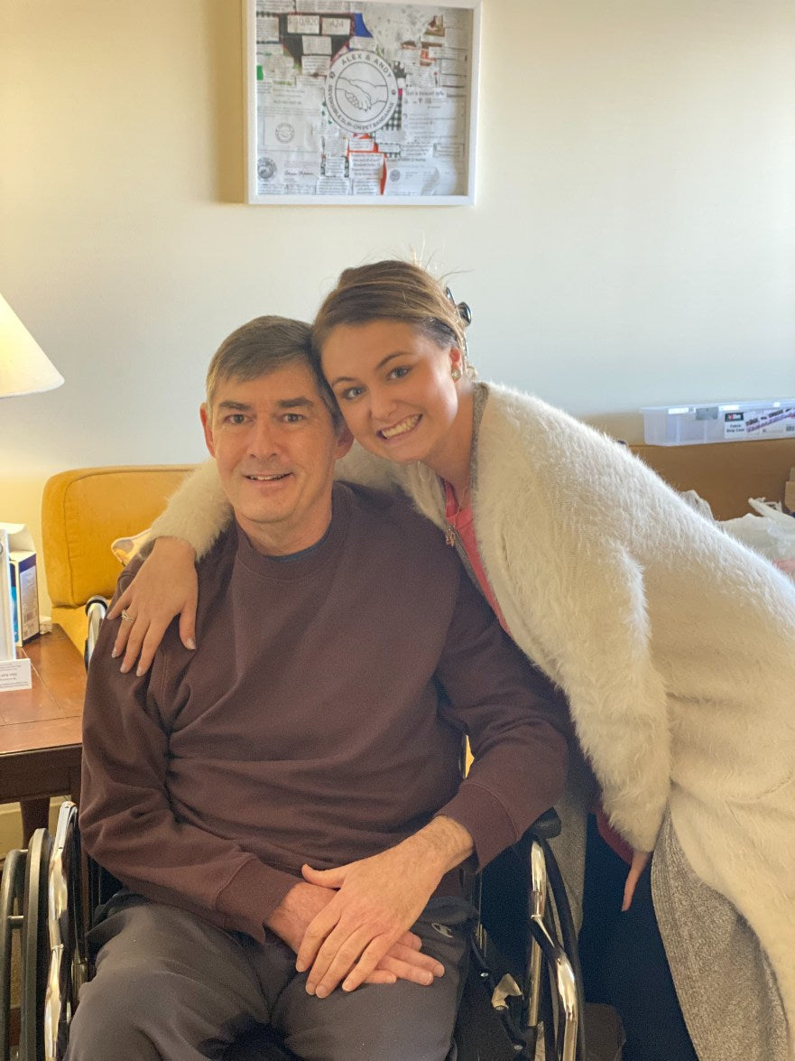 Sophie and her Uncle Andy smiling together, capturing a moment of connection and strength in their shared journey of overcoming adversity.