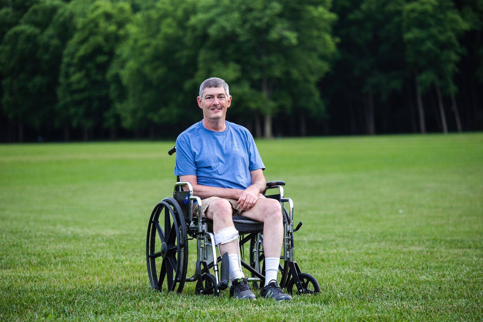 Uncle Andy models his new shirt designs. 